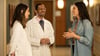 Physician assistant and reproductive endocrinologist Alberuni Zamah, MD, talk with a patient
